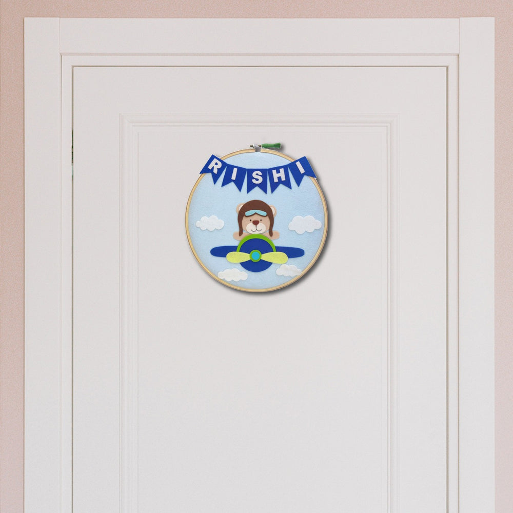 Handcrafted Personalized Teddy On Plane Hoop Nameplate - Hanging on Door Front Center