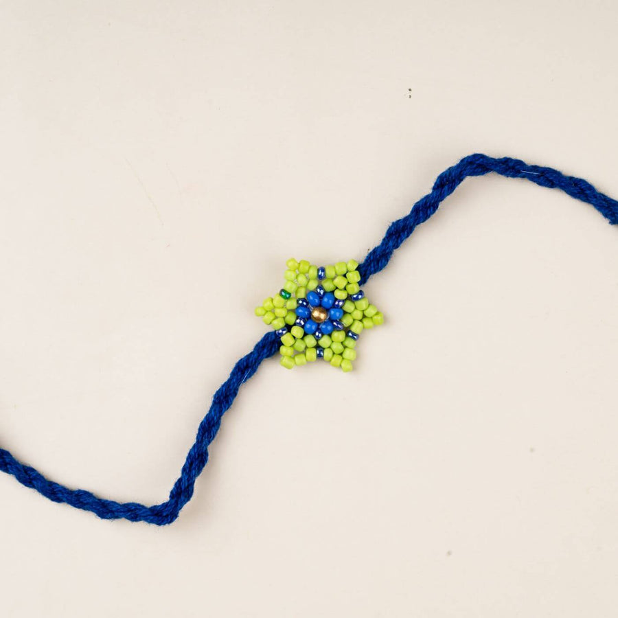 Handcrafted Glass Beads Phool Rakhi 7 - Close-up of beaded star charm