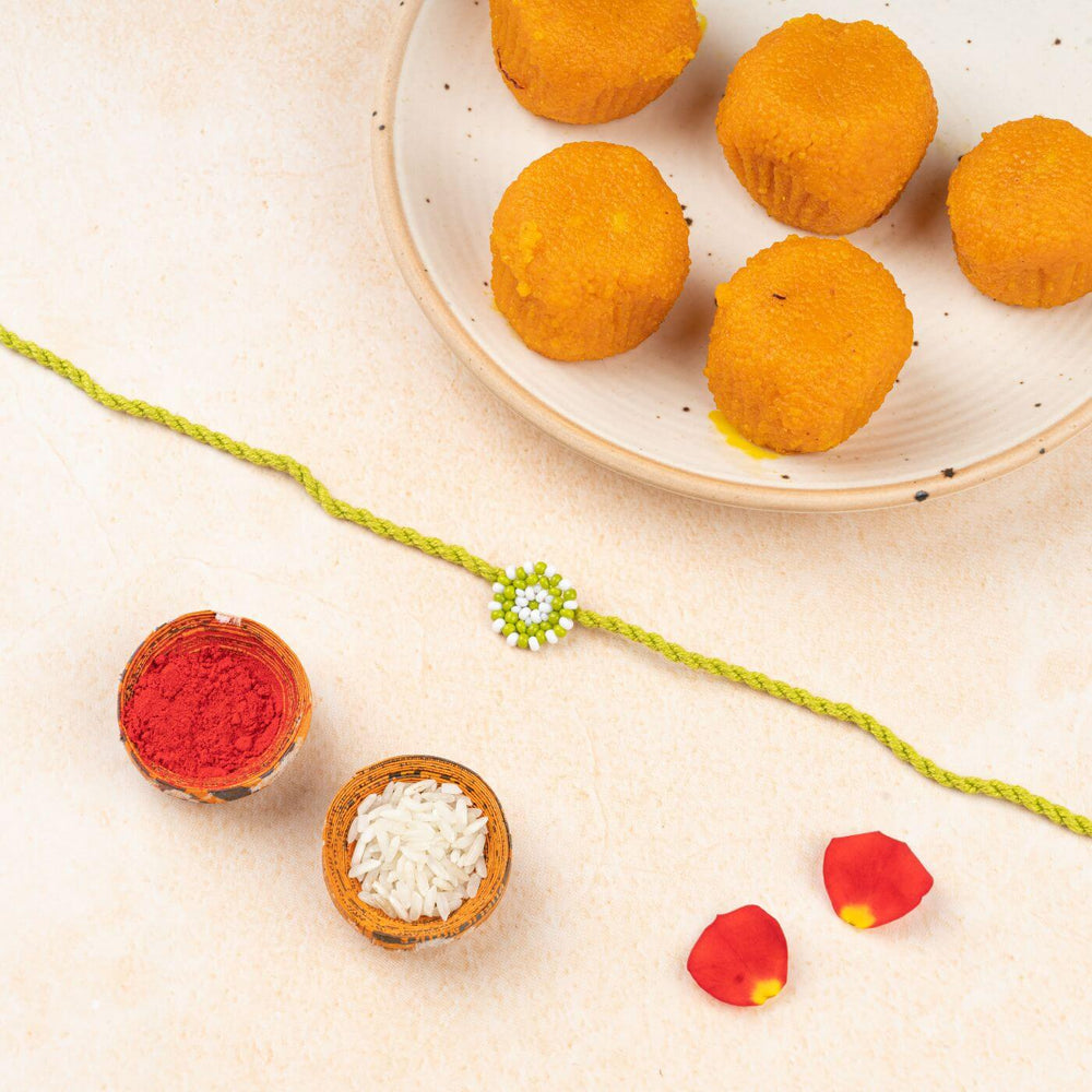 Handcrafted Glass Beads Chaand Rakhi 3 - Styled with festive items