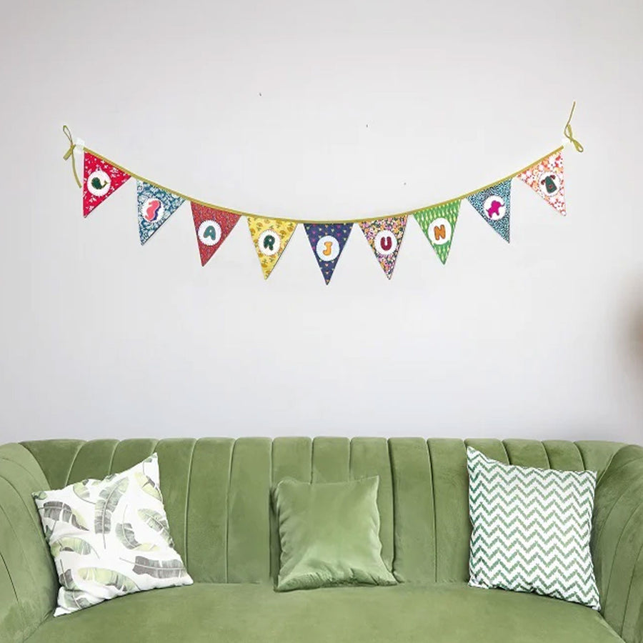 Upcycled Personalized Kids Theme Name Bunting 10 - Mounted on Wall Above Sofa
