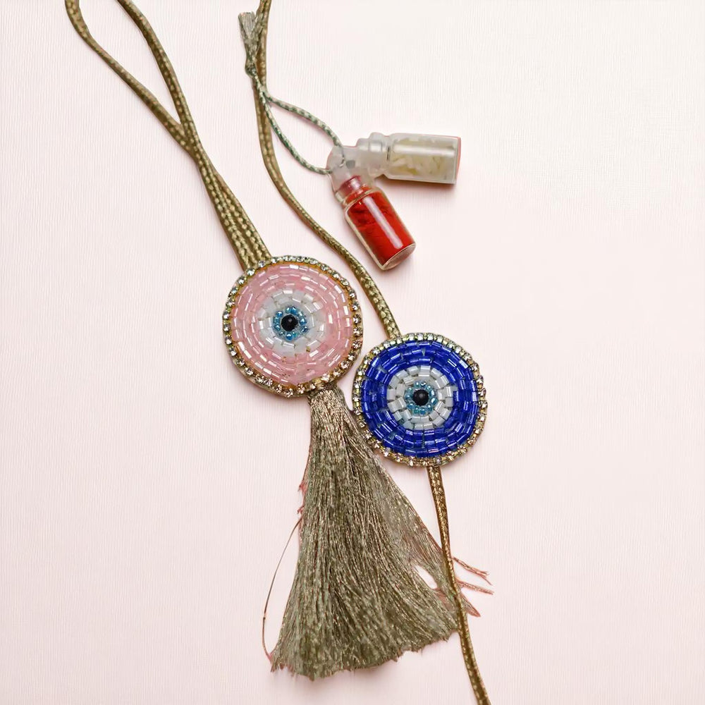 Handmade Beaded Evil Eye Bhaiya Bhabhi Rakhi With Roli Chawal Set Of 2 - Flat Lay Full Product