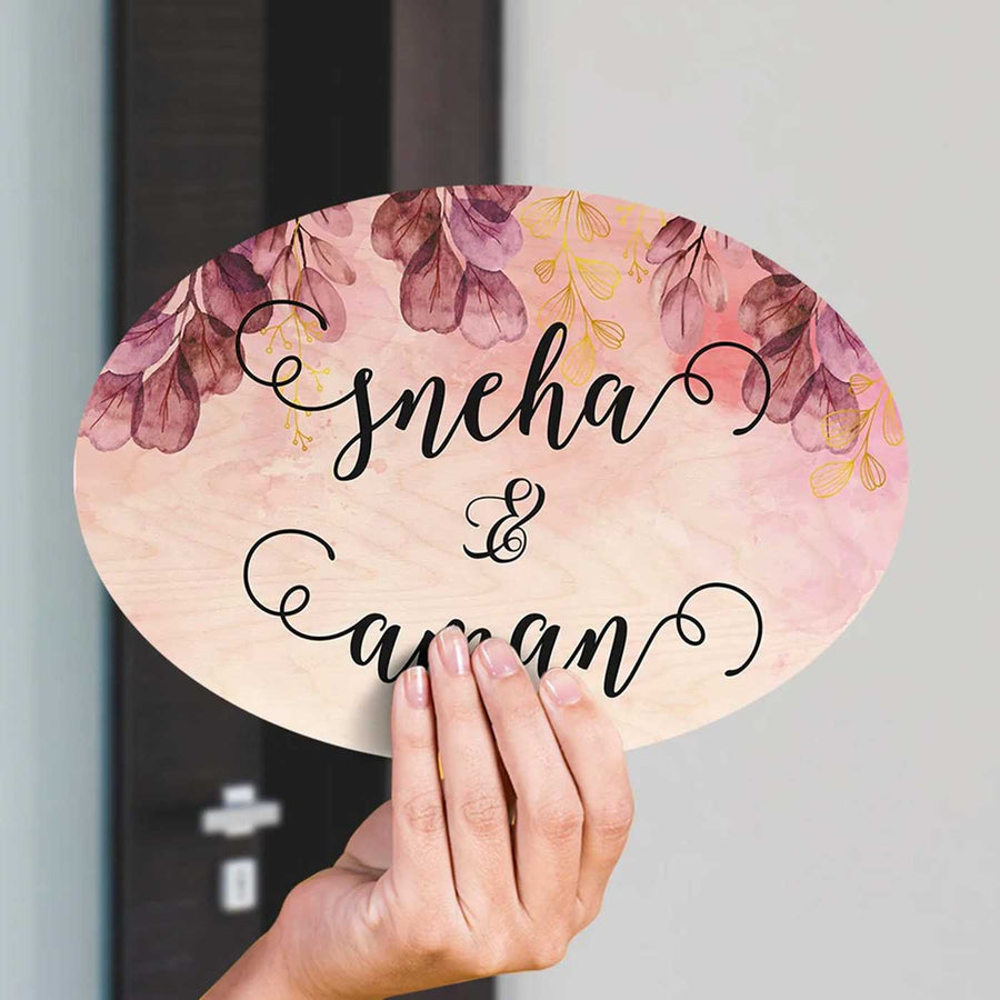Printed Red Spring Floral Wooden Oval Nameplate - Name Personalization Example Held in Hand