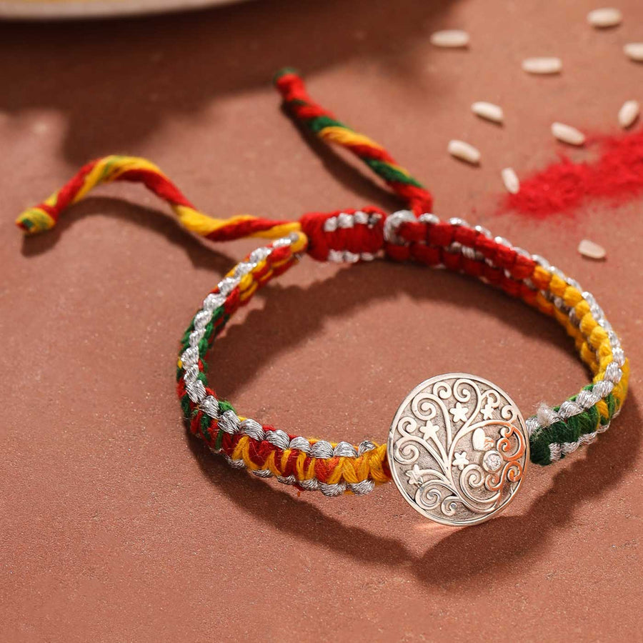 Handmade Swirl Design Silver Rakhi For Brother 1 - Front View on Surface