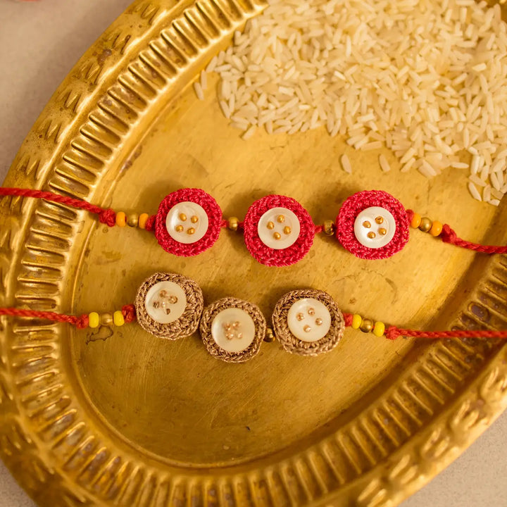 Handmade Crochet Ananta Rakhi With Roli Chawal Set Of 2 - Close-up of two bracelets