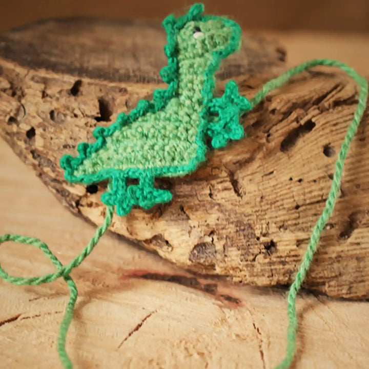 Handmade Crochet Dino Theme Kids Rakhi And Toy Combo With Roli Chawal Set Of 2 - Close-up on Crochet Bookmark Detail