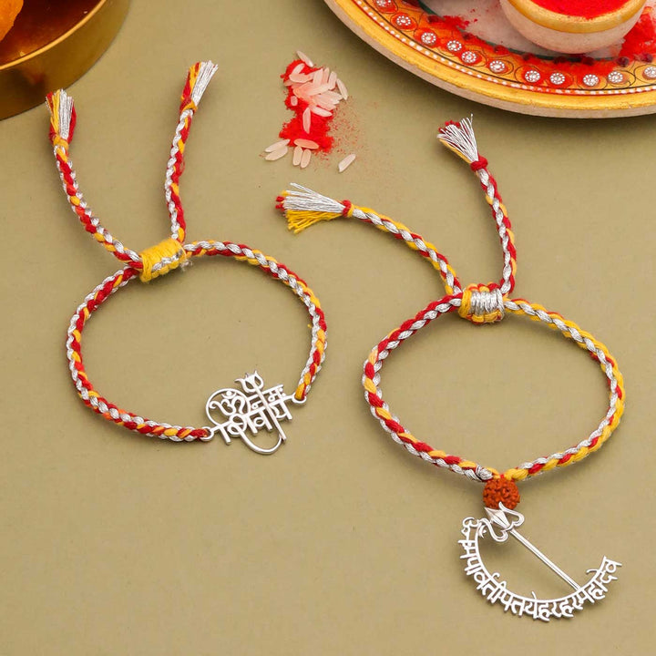 Handmade Mahadev Mantra Silver Bhaiya Bhabhi Rakhi - Two Bracelets Flat Lay