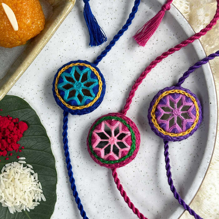 Customized Handmade Mirror Work Cotton Rakhi With Roli Chawal - Grouped Front View on Plate