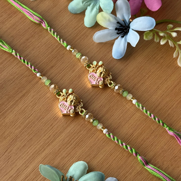 Handmade Beaded Bhai Rakhi With Roli Chawal 3 - Flat Lay with Floral Decoration