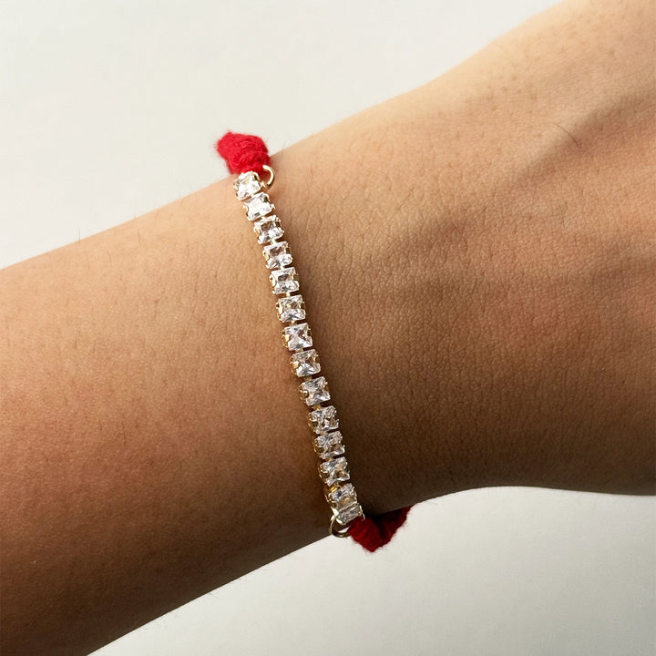 Handmade White Stone Bracelet Rakhi With Roli Chawal - On Wrist Close-up