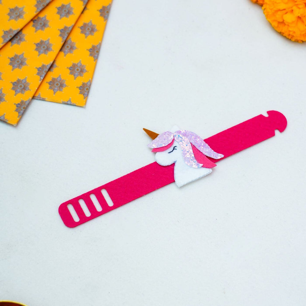 Kids Theme Felt Rakhi Band With Roli Chawal 7 - Flat Lay Full Unicorn Band