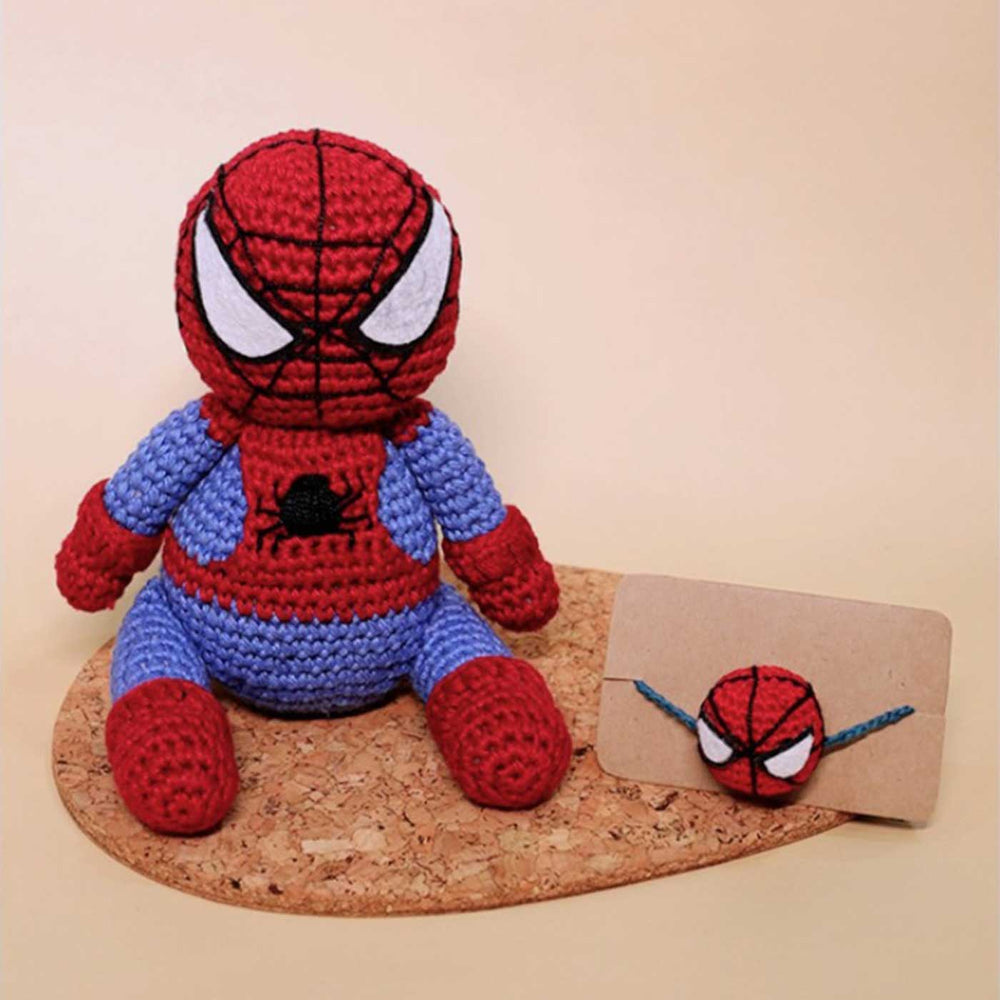 Handmade Crochet Spiderman Kids Rakhi With Roli Chawal - Set Display on Cork Mat