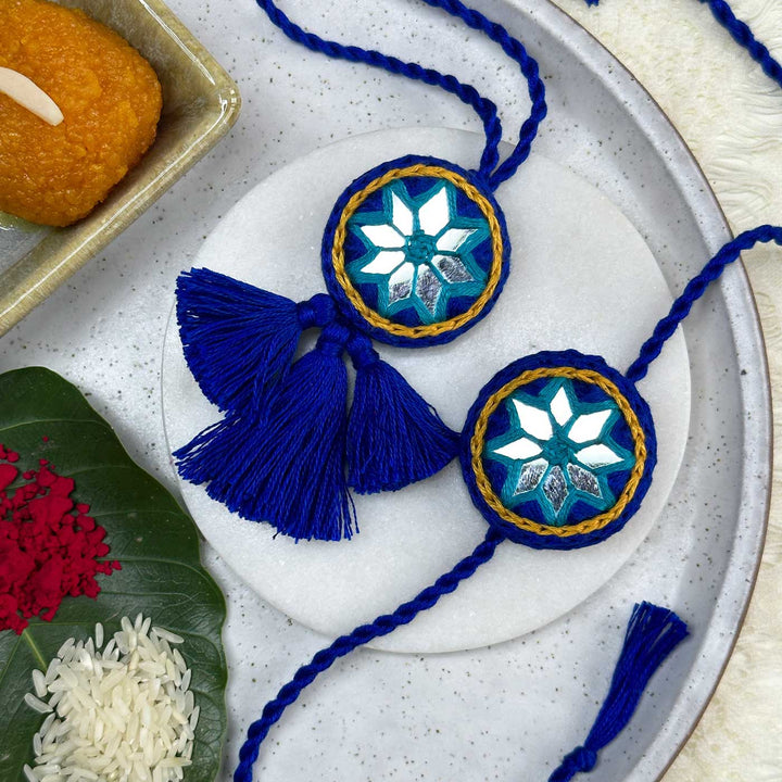 Customized Handmade Mirror Work Cotton Bhaiya Bhabhi Rakhi With Roli Chawal - Front View with Decorative Setup