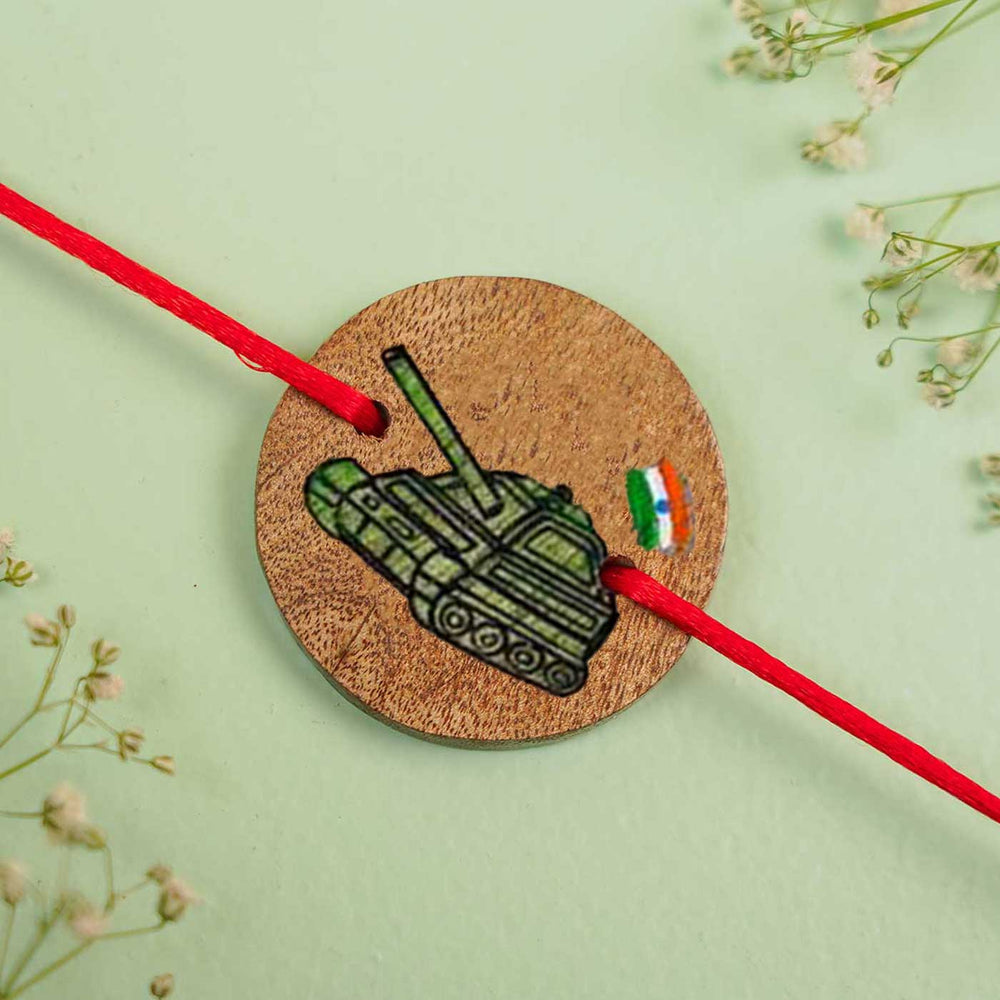 Personalized Hand Painted Army Tank Wooden Rakhi With Roli Chawal - Close-up with Floral Decoration