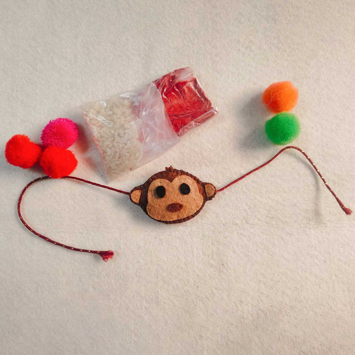 Handmade Beaded Monkey Theme Pom Pom Felt Rakhi With Roli Chawal For Kids - Full Layout with Accessories