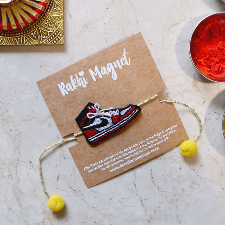 Handmade Reusable Shoe Pom Pom Felt Rakhi For Brother - Flat Lay with Festival Decor