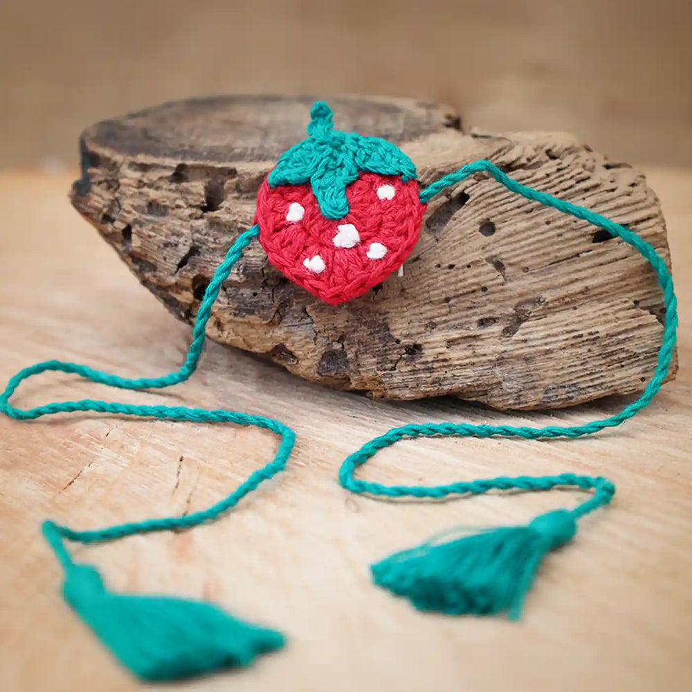Handmade Crochet Strawberry Theme Kids Rakhi And Toy Combo With Roli Chawal Set Of 2 - Strap Detail Close-up