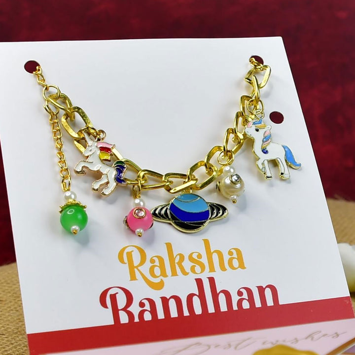 Beaded Fantasy And Space Adventure Metal Bracelet Rakhi Hamper With Chocolates And Roli Chawal For Brother Customizable Options Includes Up To 7 Goodies - Charm Bracelet Angled View