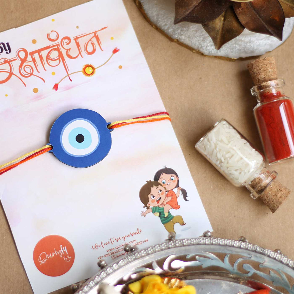 Handmade Evil Eye Design Magnet Wooden Rakhi With Roli Chawal - Styled Presentation with Raksha Bandhan Card