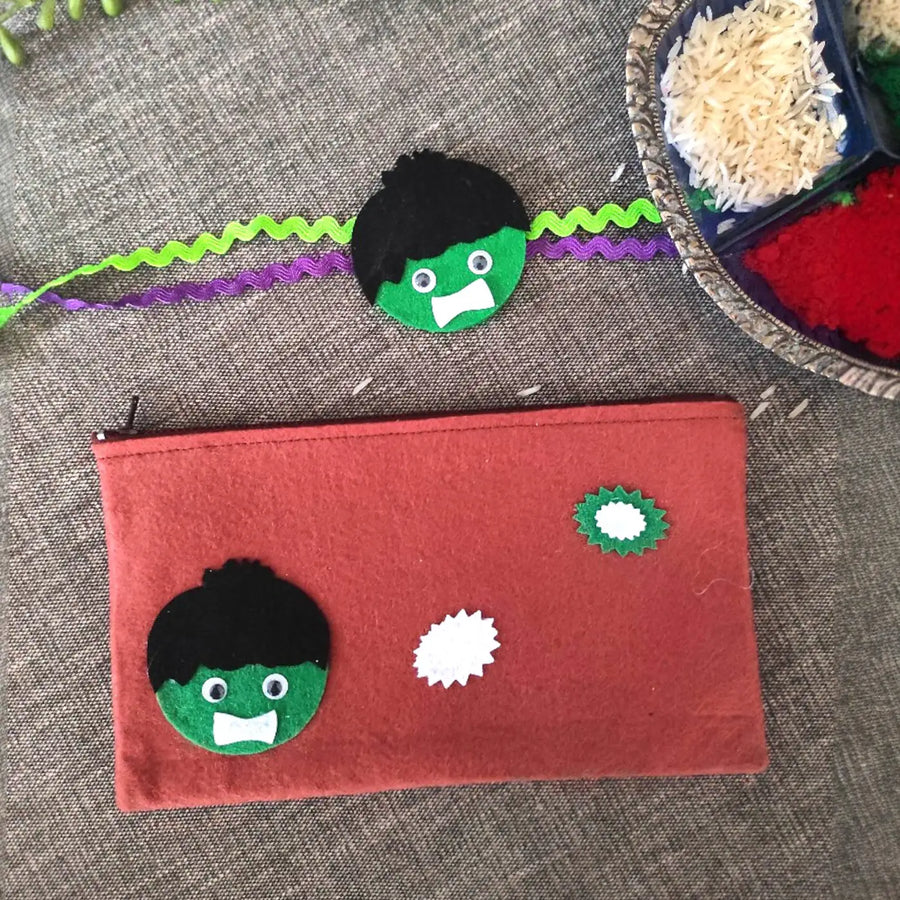 Handmade Hulk Theme Felt Rakhi Hamper With Roli Chawal Includes 1 Pouch 1 Rakhi - Pencil Case Top View with Decorations