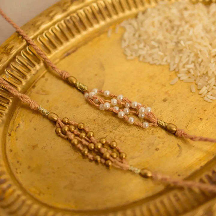 Handmade Crochet Noori Moti Rakhi With Roli Chawal Set Of 2 - Close-up of bead details