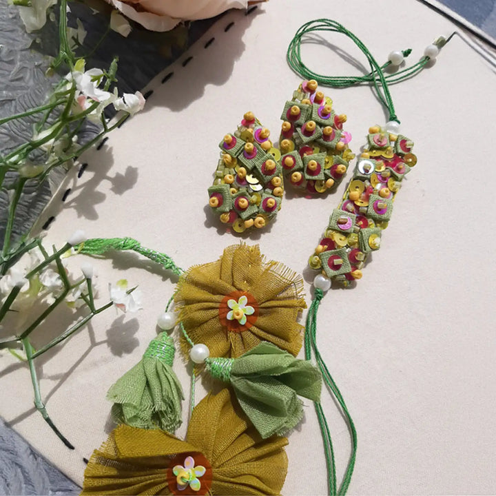 Hand Embroidered Beaded Pista Bhaiya Bhabhi Rakhi With Roli Chawal Set Of 2 - Top View Showing Full Ornament Set