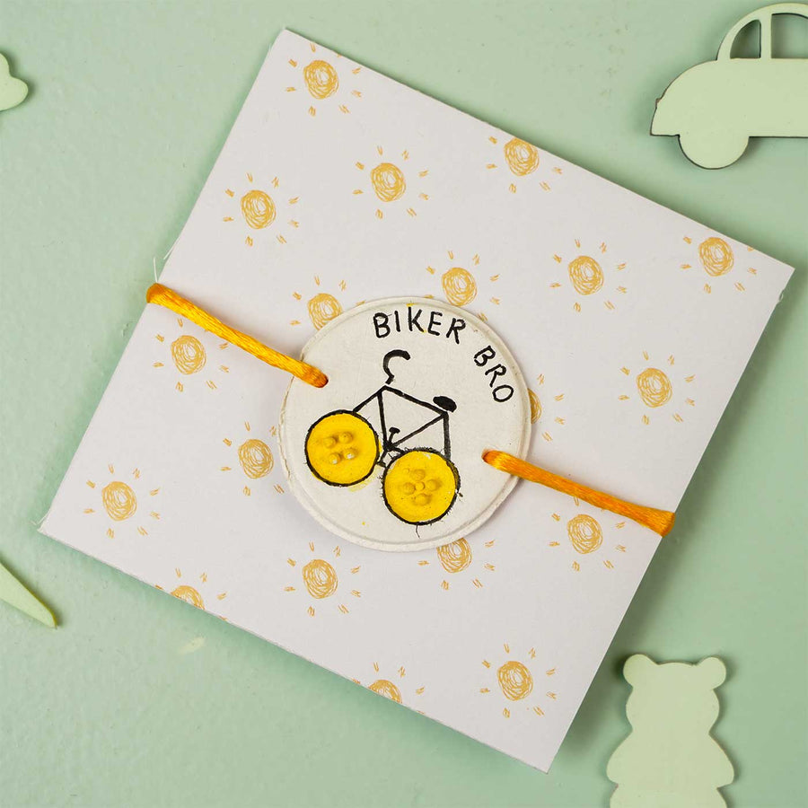 Personalized Hand Painted Biker Bro Clay Rakhi With Roli Chawal - Front View on Packaging
