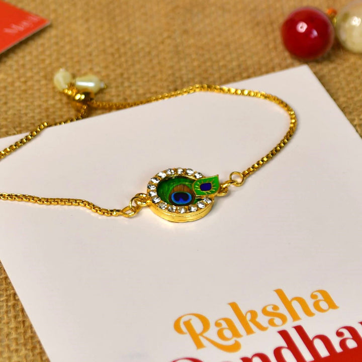 Beaded Peacock Pearl And Stone Bracelet Rakhi Hamper With Chocolates And Roli Chawal For Brother Customizable Options Includes Up To 7 Goodies - Bracelet on greeting card