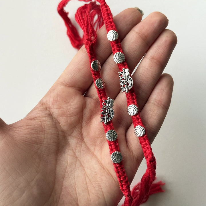 Handmade Kanha Rakhi With Roli Chawal - Held in Hand