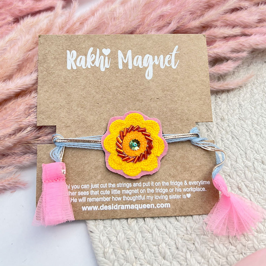 Hand Embroidered Yellow Flower Design Felt Rakhi For Brother - Front View on Cardboard Holder