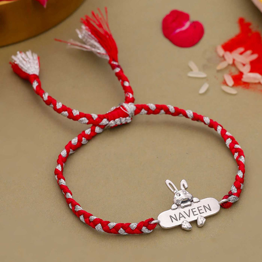 Personalized Handmade Bunny Design Silver Kids Rakhi - Front View with Name Engraving