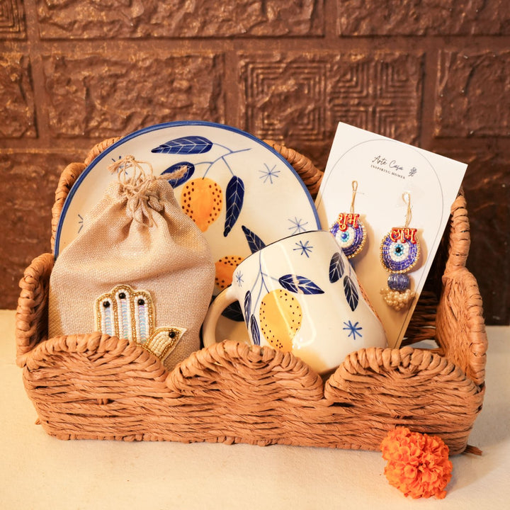Sattvik Start Diwali Gift Hamper | Includes 1 Plate, 1 Mug, 1 Dry Fruit Potli, 2 Hangings, 1 Diwali Card, 1 Basket