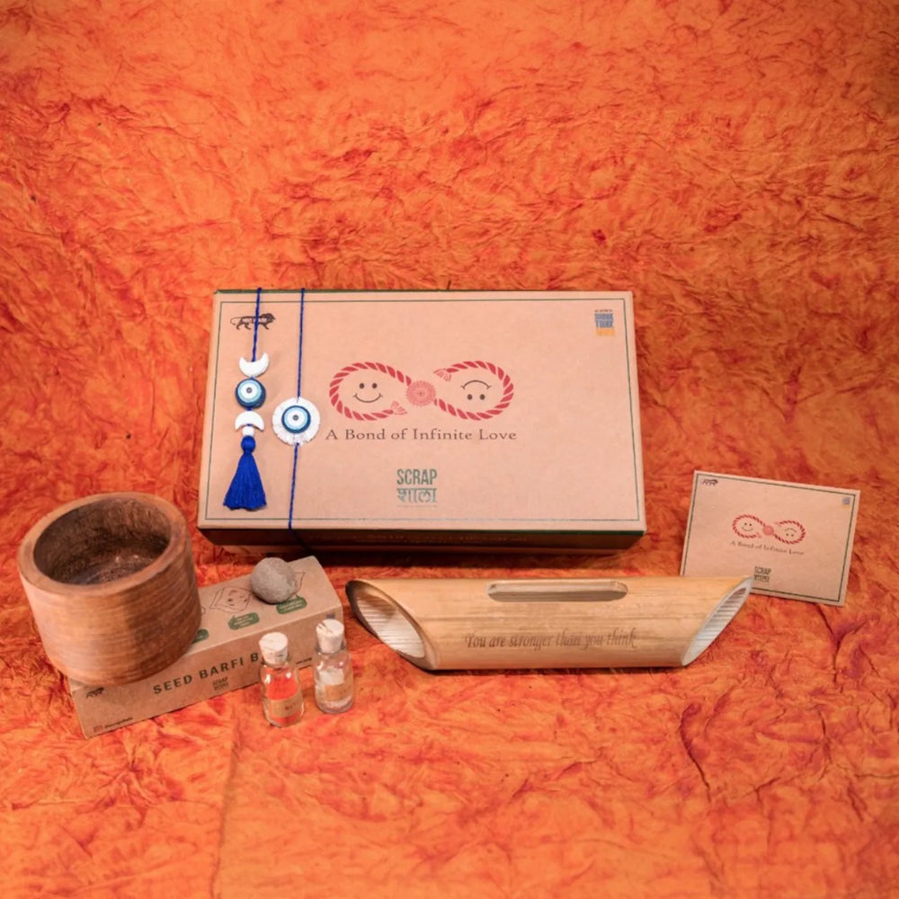 Nazarbattu Plantable Handmade Cork Rakhi Hamper With Roli Chawal - Gift set packaging with accessories