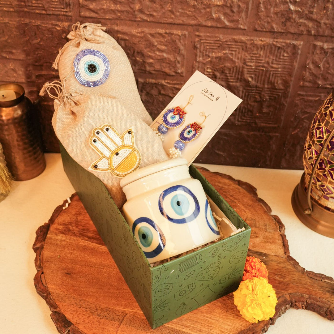 Shubh Nazar Diwali Gift Hamper | Includes 1 Storage Container, 2 Hangings, 2 Dry Fruit Potlis, 1 Diwali Card, 1 Gift Box