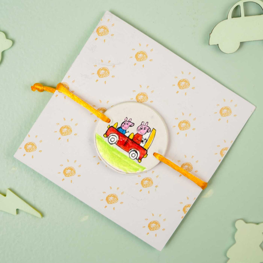 Personalized Hand Painted Peppa Pig Theme Clay Rakhi With Roli Chawal - Product on Display Card