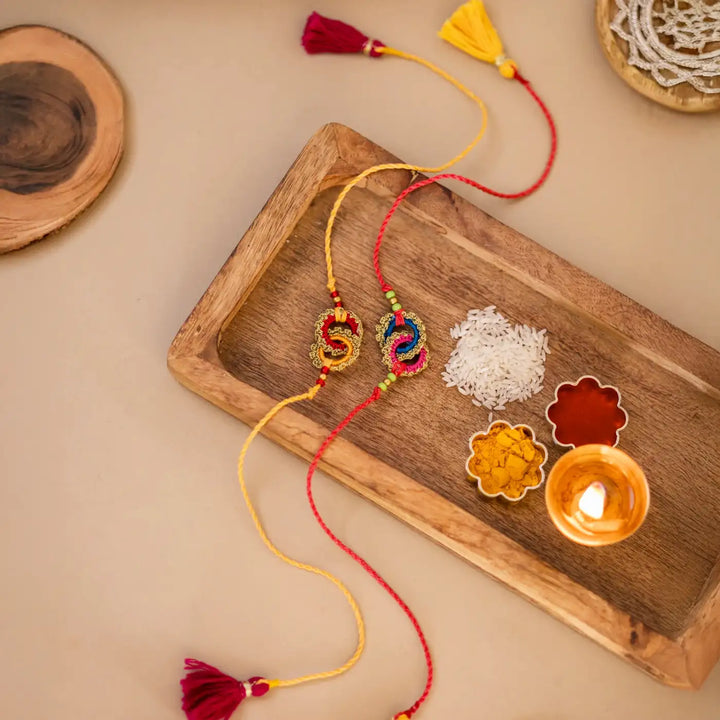Handmade Crochet Bandhan Rakhi With Roli Chawal Set Of 2 - Full Length Display with Accessories