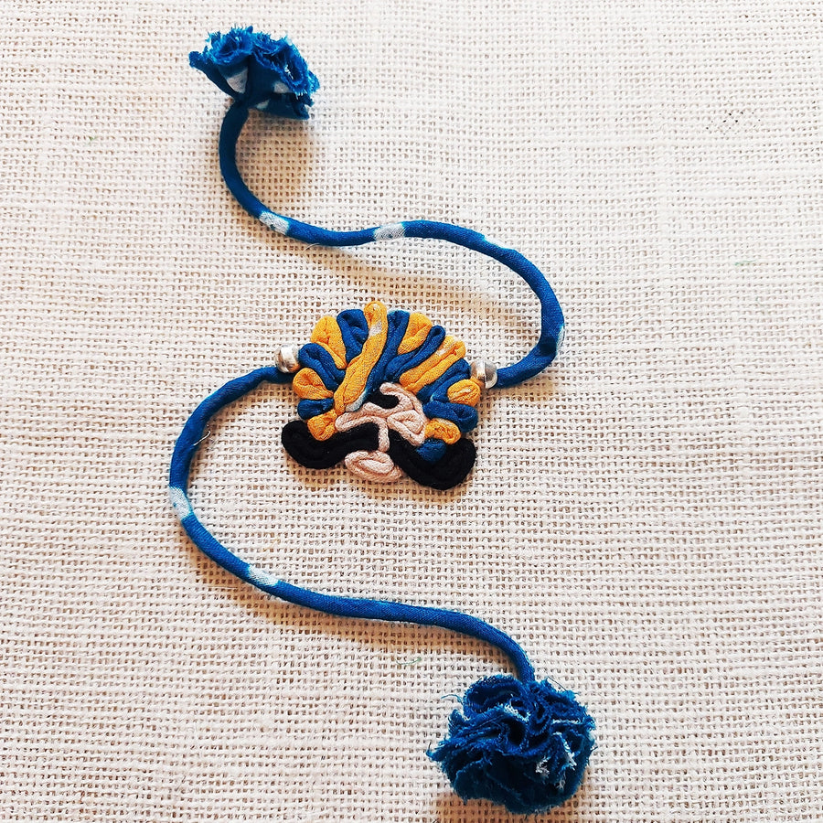 Handmade Dori Work Ethnic Rabari Rakhi With Roli Chawal - Flat Lay Blue Thread Bracelet