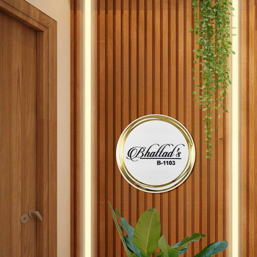 Personalized Round White And Gold Acrylic Name Plate - Mounted on Indoor Wood Paneling