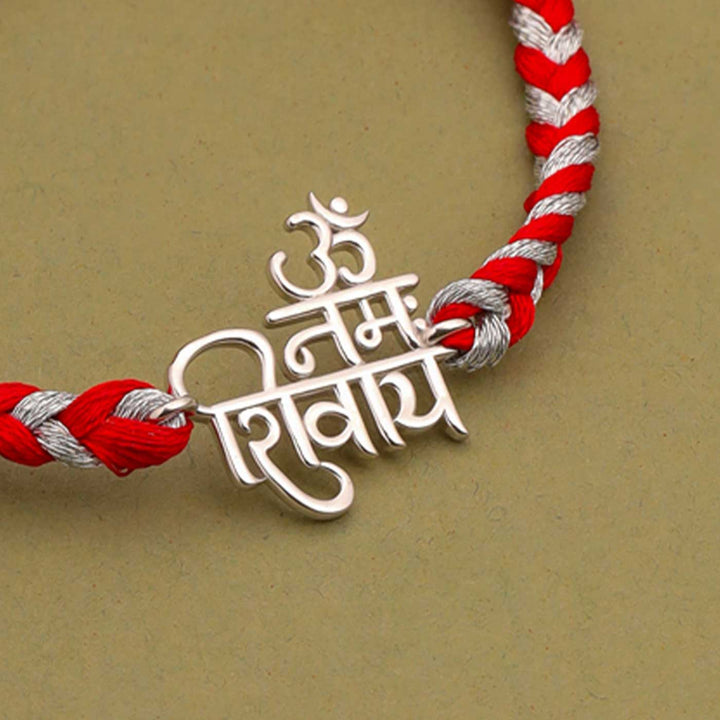 Handmade Nama Shivaya Design Religious Silver Rakhi For Brother - Close-up of Pendant Detail
