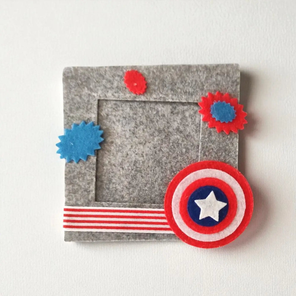 Photo Personalized Captain America Theme Felt Rakhi Hamper With Roli Chawal Includes 1 Magnetic Photo Frame 1 Rakhi - Front View of Decorated Frame