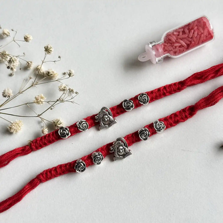 Handmade Shiv Motif Rakhi With Roli Chawal - Flat Lay Highlighting Bracelet Details