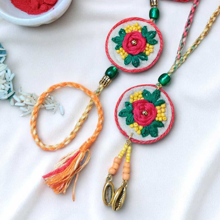 Handmade Embroidered Flower Theme Cotton Rakhi With Roli Chawal For Bhaiya And Bhabhi - Close-up of Embroidered Detailing