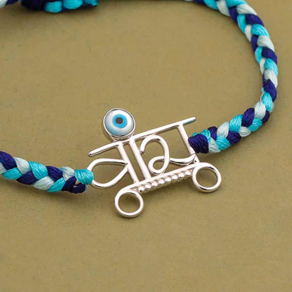 Handmade Veera Design Evil Eye Silver Rakhi For Brother - Close-up of Pendant Details