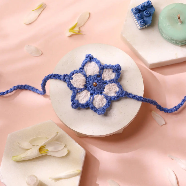 Handmade Crochet White & Blue Flower Rakhi With Roli Chawal