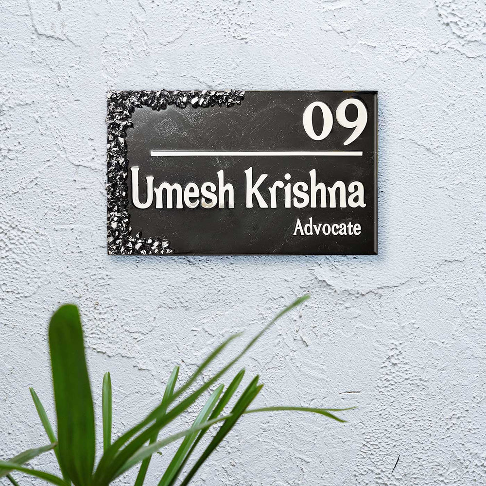 Personalized Black And Silver Resin Name Plate - Mounted on Wall Showing Text