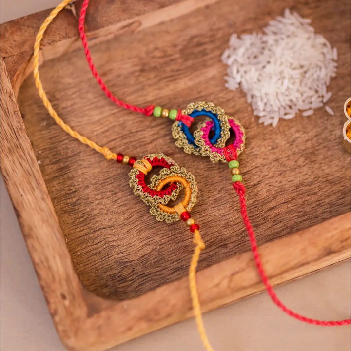 Handmade Crochet Bandhan Rakhi With Roli Chawal Set Of 2 - Close-up of Decorative Threads