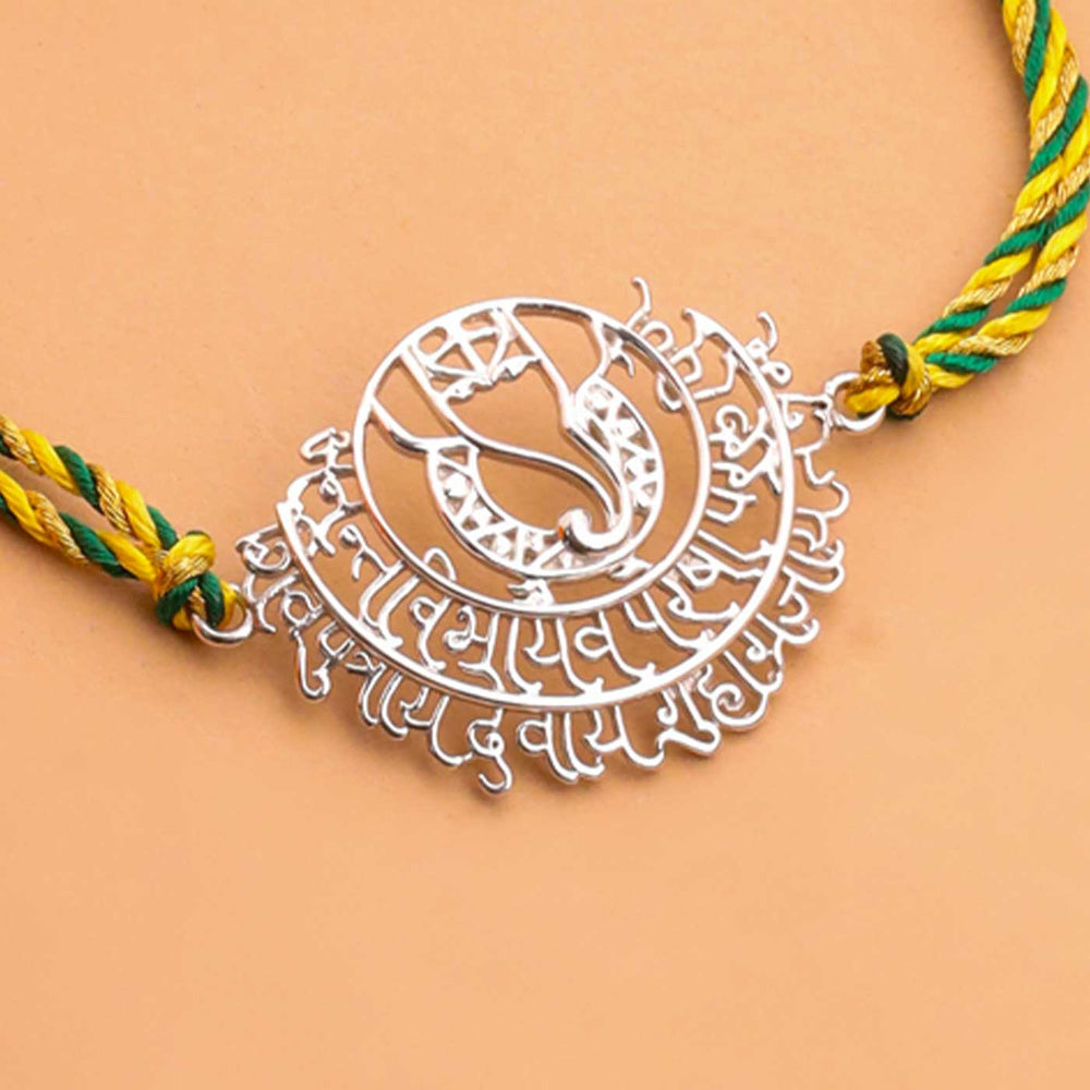 Handmade Ganesha Theme Religious Silver Rakhi For Brother - Close-up of Pendant Details