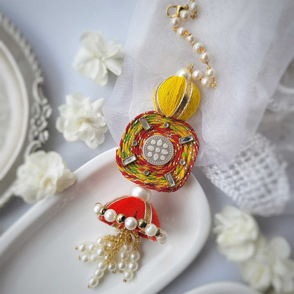 Handmade Beaded Lotus Design Silver Rakhi Hamper With Roli Chawal For Bhaiya And Bhabhi - Close-up of Single Piece