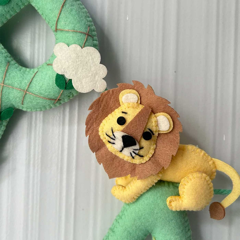 Personalized King Of The Jungle Felt Bunting Garland For Kids - Close-up on Lion Plush Detail