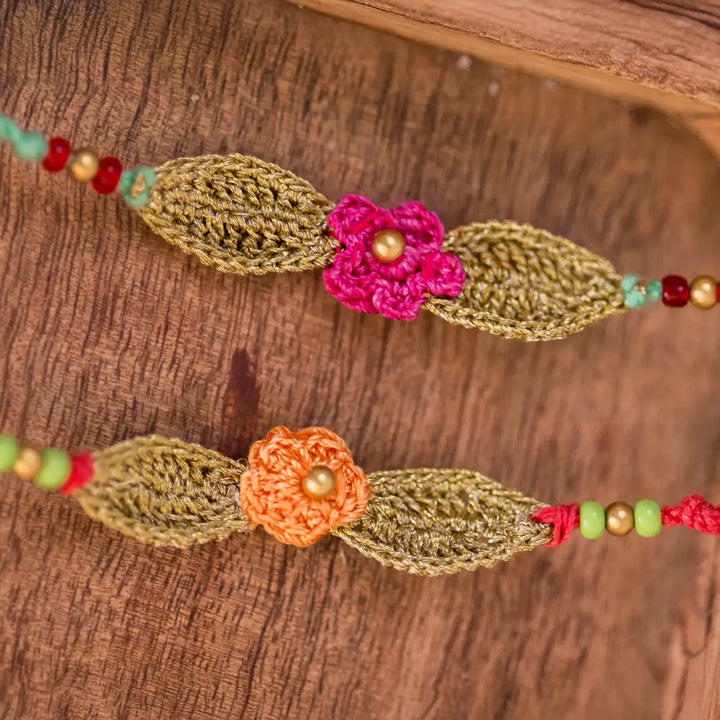 Handmade Crochet Bageeya Rakhi With Roli Chawal Set Of 2 - Close-up of Crochet Flower Detail