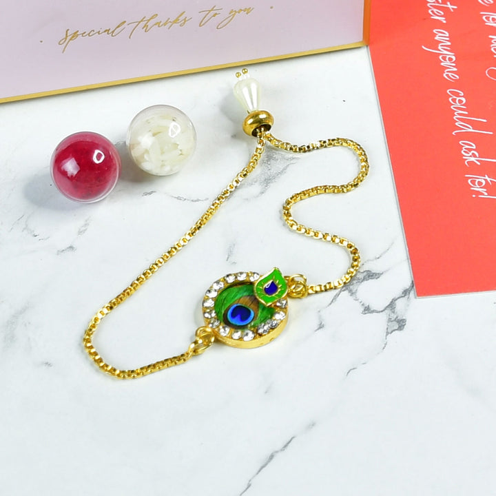 Beaded Peacock Pearl And Stone Bracelet Rakhi Hamper With Chocolates And Roli Chawal For Brother Customizable Options Includes Up To 7 Goodies - Close-up of Rakhi bracelet